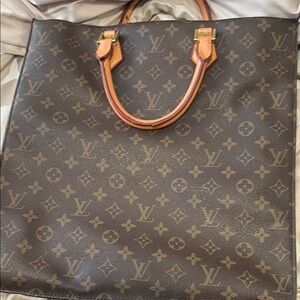 Louis Vuitton Brown Tan Tote Bag with Monogram Design and Structured Shape